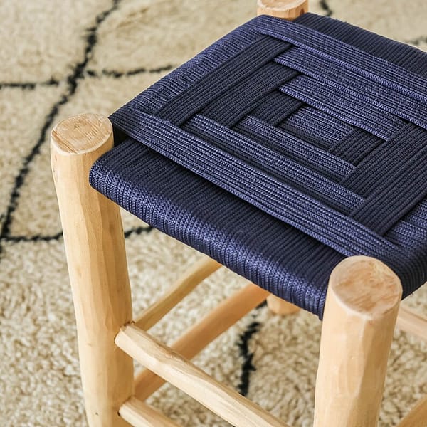 Natural stool in raw wood and dark blue rope braiding